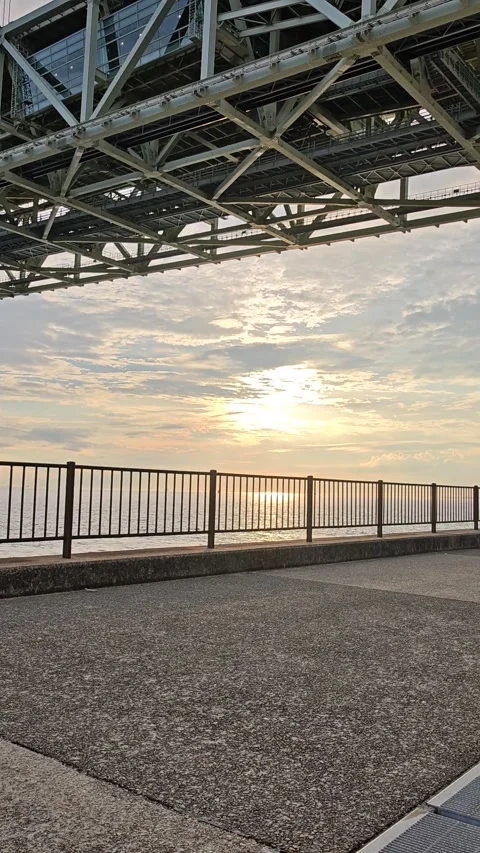 Sunset Under Akashi Kaikyō Bridge in Kobe, Japan Stock Footage 321434907