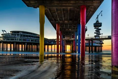 Sunset under the pier of Scheveningen under a beautiful sunny day, Netherland Stock Photos