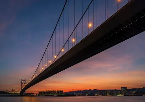 Sunset Under The Tsing Ma Bridge Of Hong Kong Stockfoto's