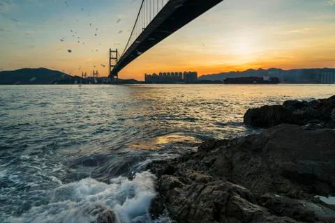 Sunset Under The Tsing Ma Bridge Of Hong Kong 写真素材