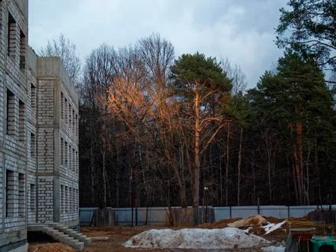 Sunset on unfinished construction in spring. Stock Photos