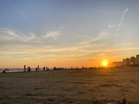 Sunset on the urban beach Stock Photos