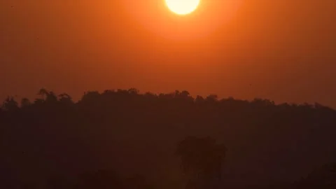 The sunset is very beautiful emitting orange light. shoot by timelapse. Stock Footage 219329891