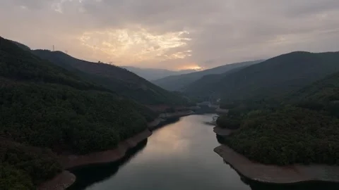 Sunset video over the lake and forest mountain Stock Footage 291404035