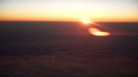Sunset view from the airplane. Fly above the clouds. Stock-Footage 157205854