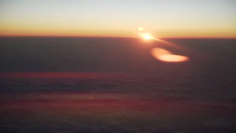 Sunset view from the airplane. Fly above the clouds. Stock Footage 157205867