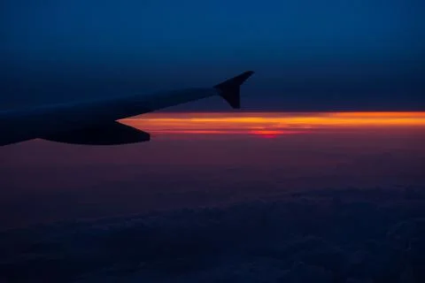 Sunset view from an airplane Stock Photos