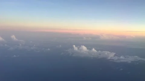 Sunset view from airplane window Stockbeeldmateriaal 62174033