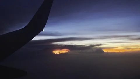 Sunset view from an airplane window Stock Footage 283816568