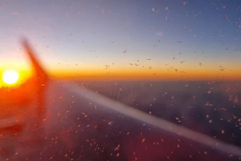Sunset View from Airplane Window with Stunning Sky and Sunlight Stock Photos