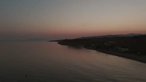 Sunset view of Almayate beach, one of the three best nude beaches in all of Stock Footage 344026924