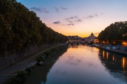 Sunset view of Basilica St Peter, bridge Sant Angelo in Rome. Italy. Stock Photos
