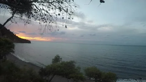 Sunset view at a beach near the mountain Video stock 149056311