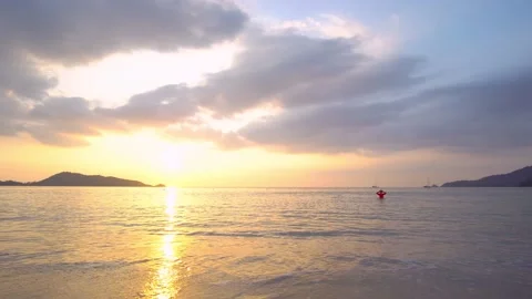 Sunset view beach sea sand sunlight and water wave Stock Footage 149529536