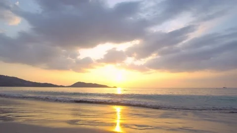 Sunset view beach sea sand sun water wave beautiful background Stock Footage 149529571