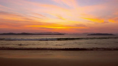 Sunset view beach sea sand sun water wave beautiful background Video stock 151029929