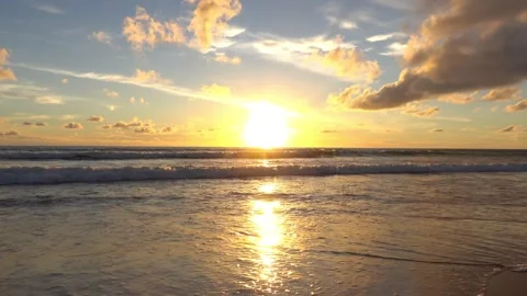 Sunset view beach sea sand water wave blue sky background Stock Footage 153378156