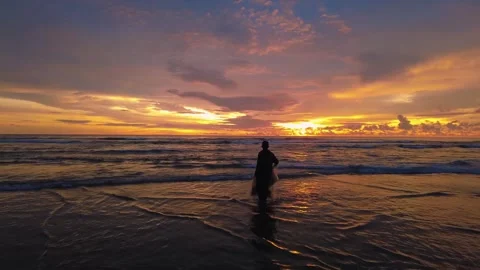 Sunset view on the beach side, beautiful orange and yellow sky 動画素材 300253921