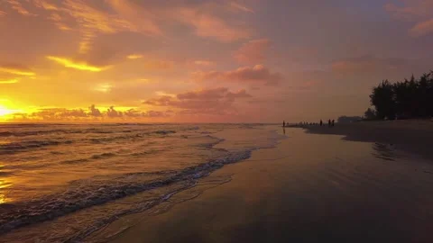 Sunset view on the beach side, beautiful orange and yellow sky 動画素材 300253926