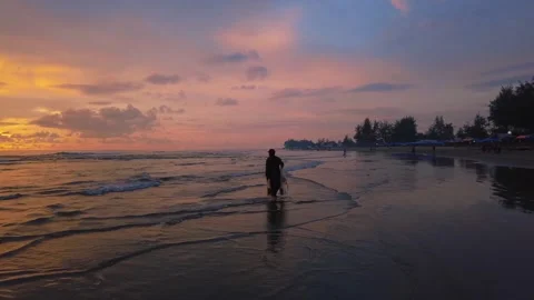 Sunset view on the beach side, beautiful orange and yellow sky 動画素材 300253939