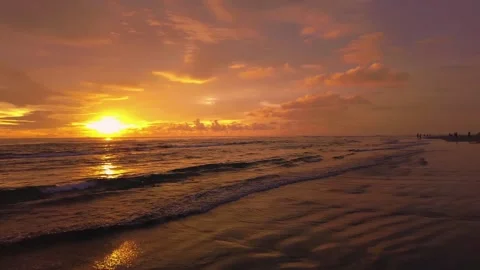 Sunset view on the beach side, beautiful orange and yellow sky 動画素材 300253970