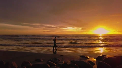 Sunset view on the beach side, beautiful orange and yellow sky 動画素材 300254105