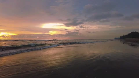 Sunset view on the beach side, beautiful orange and yellow sky 動画素材 300254147