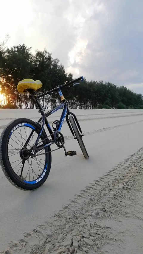 Sunset view with bicycle background at beach Stock Footage 161369658
