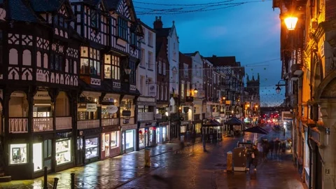 Sunset view with black and white traditional old buildings and shops, The Cross. Stock Footage 255810923