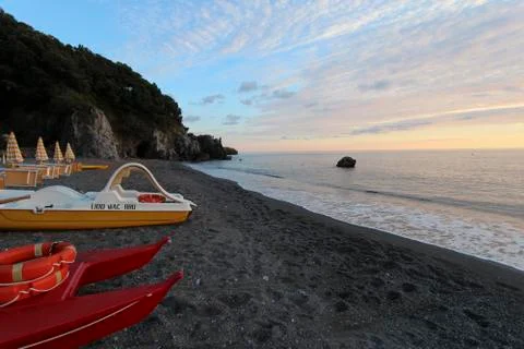 Sunset view of a calm empty beach in Southern Italy Stock Photos