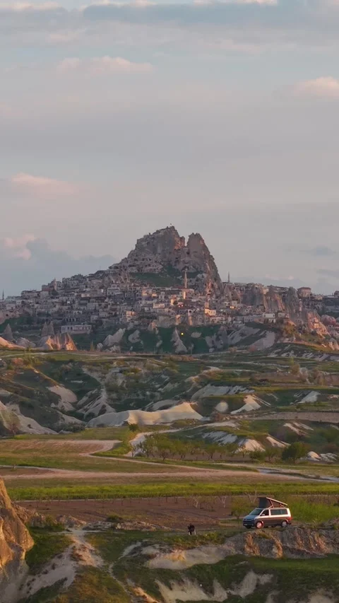 Sunset view of Cappadocia with the town of Uchisar Stock Footage 336219278