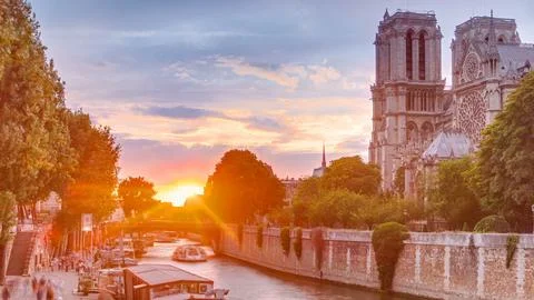 Sunset view of Cathedral Notre Dame de Paris timelapse in Paris, France. Stock Photos