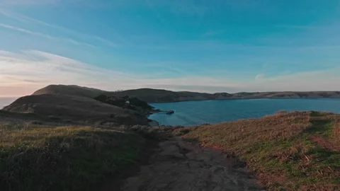 Sunset View from Chimney Rock Trail over a Coastal Dock and Bay Stock Footage 322682357