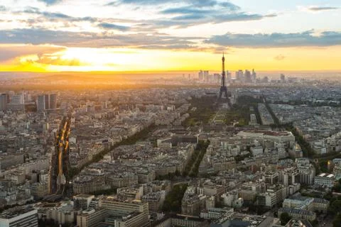 Sunset view of city skyline with Eiffel Tower in Paris, France Photos