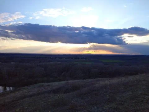 Sunset view with clouds Stock Photos