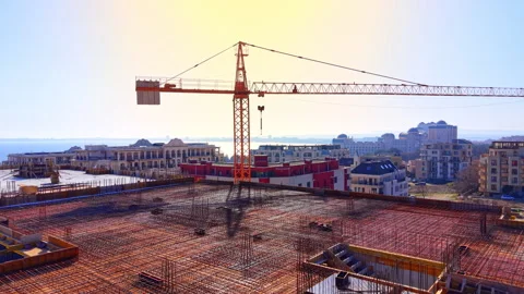 Sunset view of construction crane overlooking the sea, Bulgaria 스톡 동영상 338999574