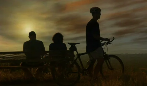 Sunset View Couple and Mountain Biker Stock-Footage 262489