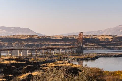 Sunset view of The Dalles bridge over the Columbia River that separates Stock Photos