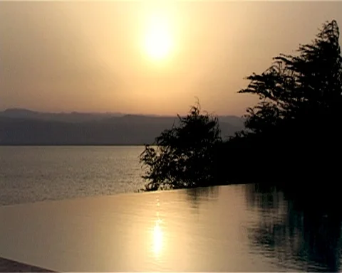 Sunset view of Dead Sea from hotel pool. Dead Sea, Jordan. Stock Footage 121136110
