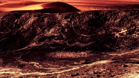 Sunset view of a desert landscape with rugged terrain and soft dunes Stock Footage 342816236