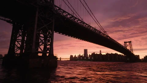 Sunset view of downtown NYC under Williamsburg Bridge Stock Footage 346427394