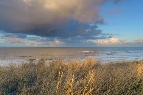 Sunset View from dune top over North Sea from the dutch islands Stock Photos