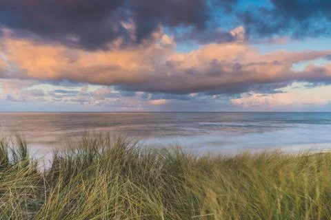 Sunset View from dune top over North Sea from the dutch islands Stock Photos