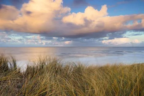 Sunset View from dune top over North Sea from the dutch islands Stock Photos