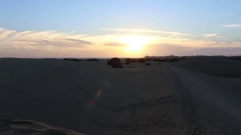 Sunset view from the dunes of Maspalomas; The Lighthouse on the background Stock Footage 74172565