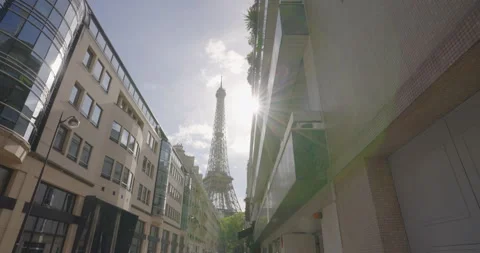 Sunset. View of the Eiffel Tower from one of the famous streets of Paris Stock Footage 248473589