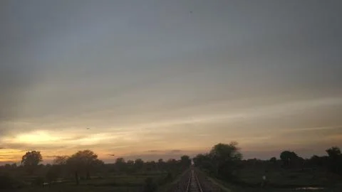 Sunset view in evening sky in farm countryside area Stock Photos