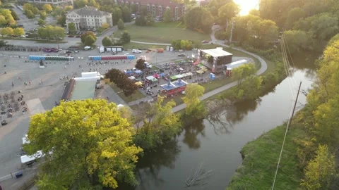 Sunset view of festival grounds with river surrounding in La Crosse, Wisconsin. Video stock 166223745