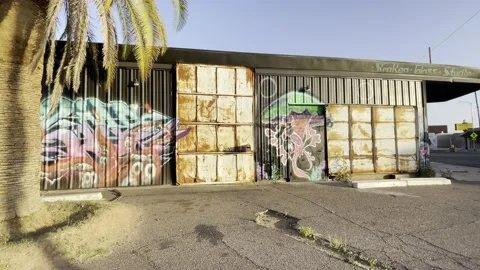 Sunset view graffiti covered art warehouse building in Phoenix Stock Footage 188247859