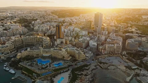Sunset view of highest building of Maltese island. St. Julian's city Video stock 268244248